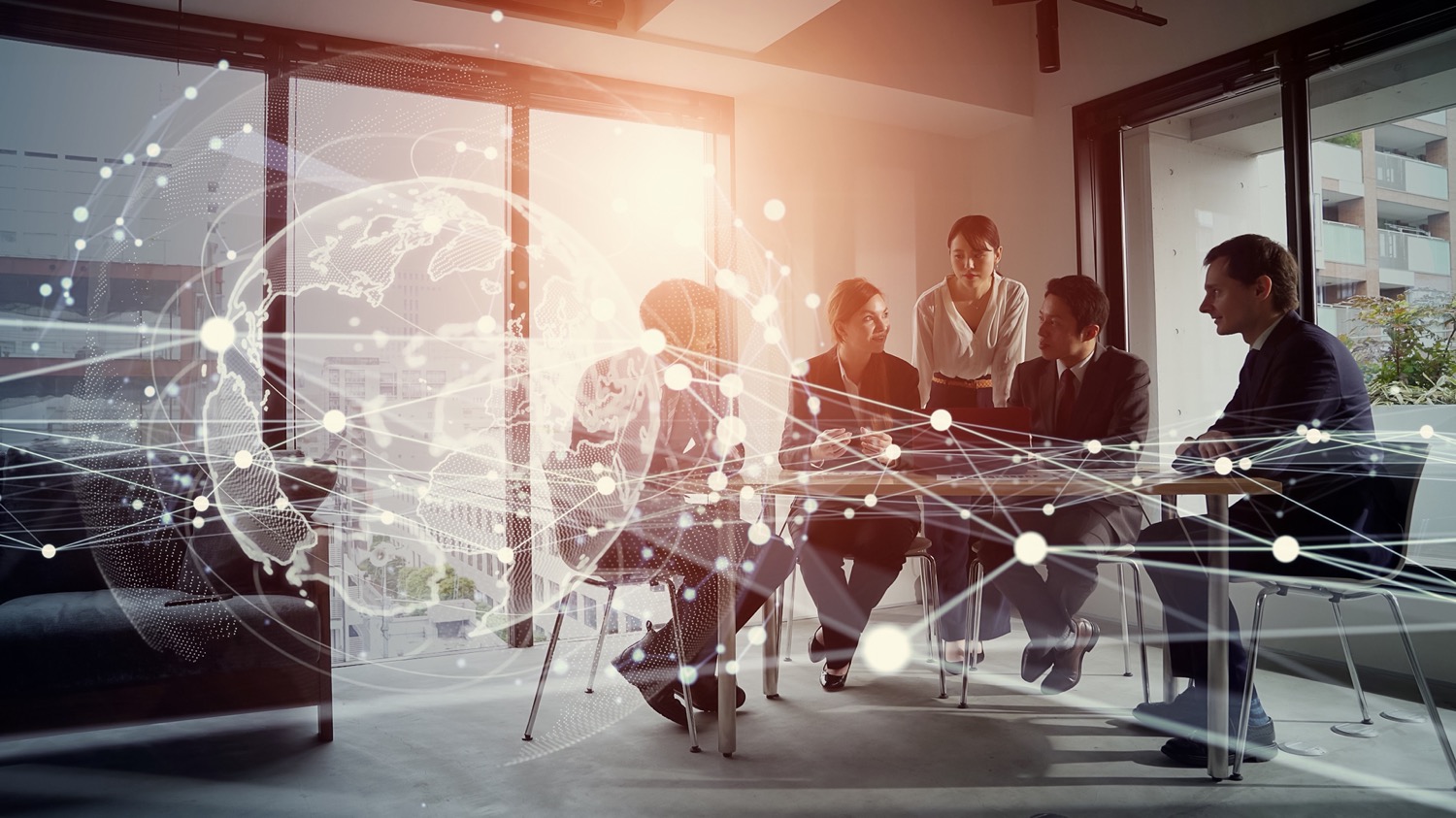 group in office with digital overlay